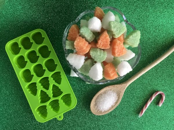 xmas tree epsom salt gems with mold and wooden spoon