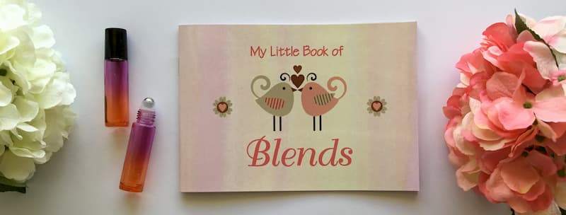 my little book of blends birdie design with orange and purple ombre roller bottles and white and pink hydrangeas