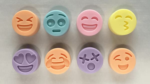 colored soap emoji faces