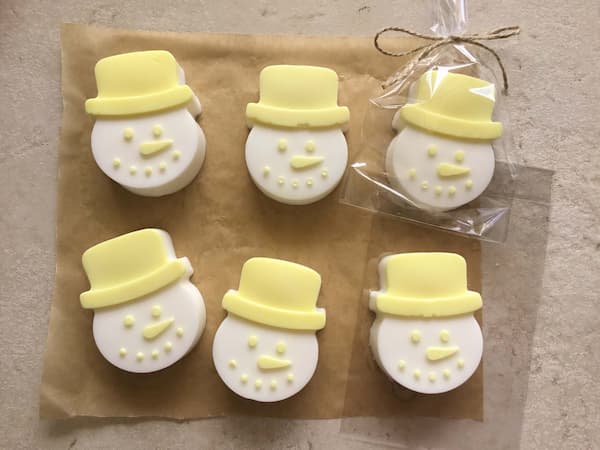 snowman soap with yellow hats