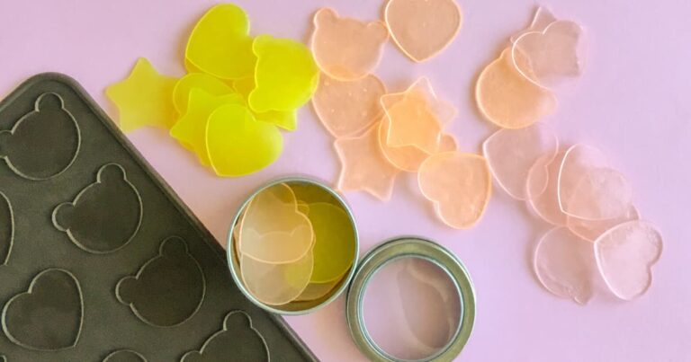 super thin single use soap bars colored pink, yellow and orange in the shapes of hearts, stars and teddies.